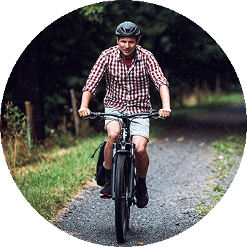 Man on a bike.