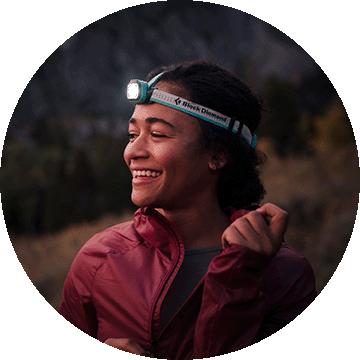 Woman with light mounted on her head.