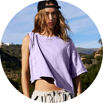 Woman in lilac top.
