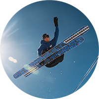 Freestyle skier performing high aerial jump