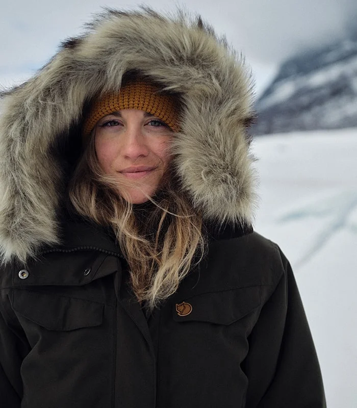 Woman with a black parka.