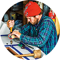 Man working on something in garage