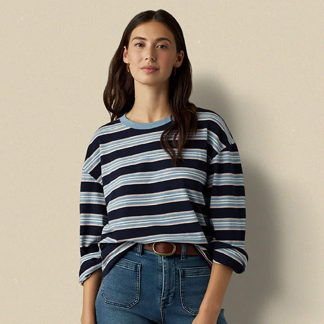 Woman wearing striped long sleeve casual top