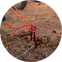 Close-up of a tent stake.