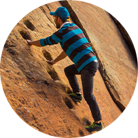 Man Rock Climbing