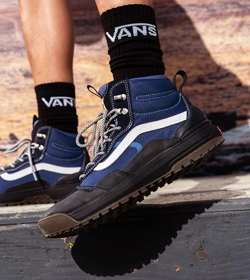 Blue shoes with a white stripe.