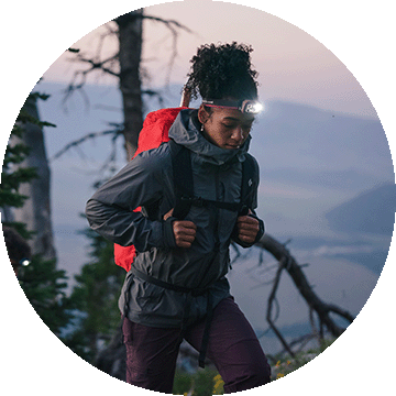 Hiker bracing backpack.