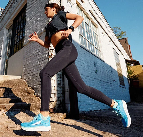 Woman running on a street.