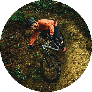 Biker on rocky terrain.