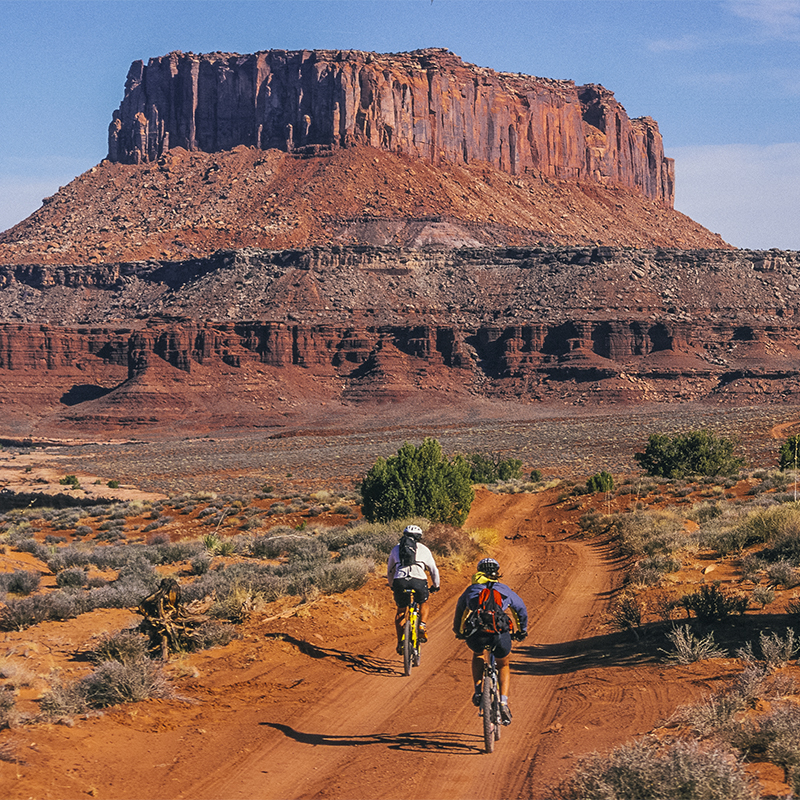 Bikers on the White Rim Road at Canyonlands.