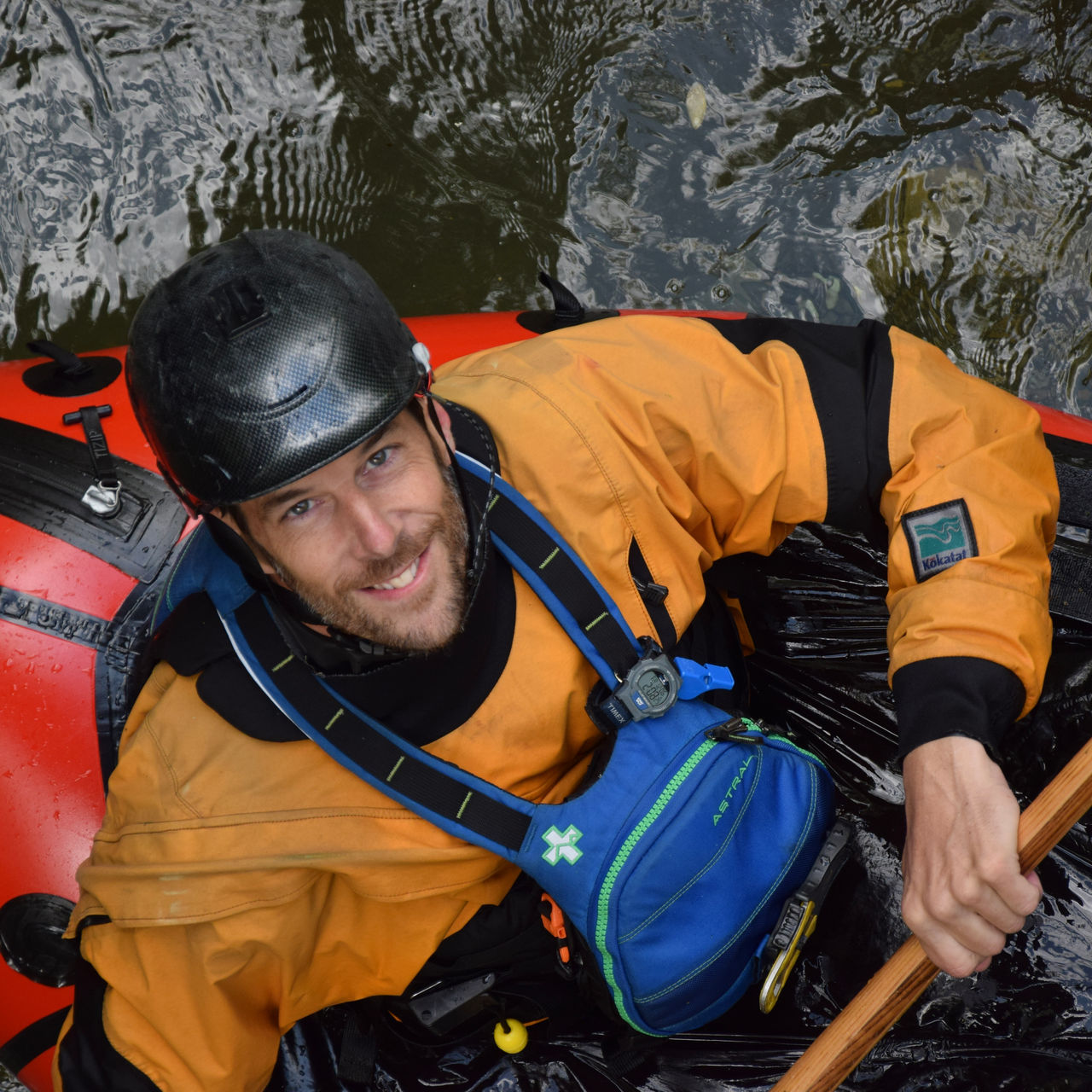 Kevin Colburn looks up while paddling