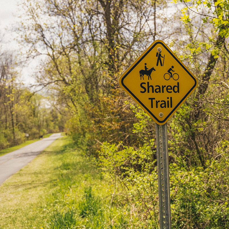 Shared Trail (hiking, biking, and horseback riding activities) sign in Elm Creek Park Reserve in Maple Grove, MN