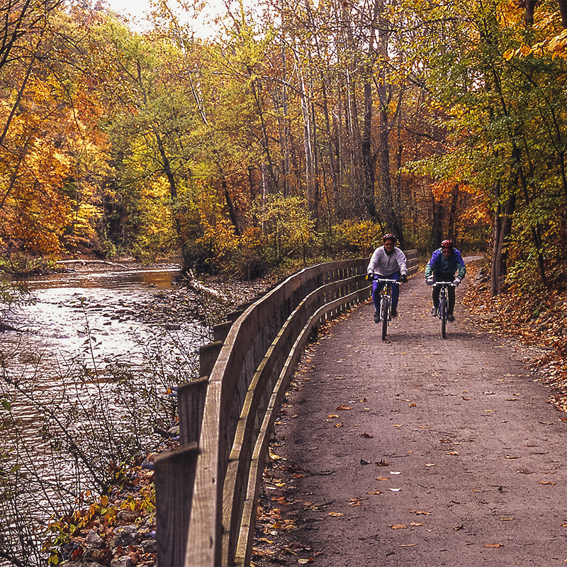 Two bikers ride on the towpath at Cuyahoga Valley National Park