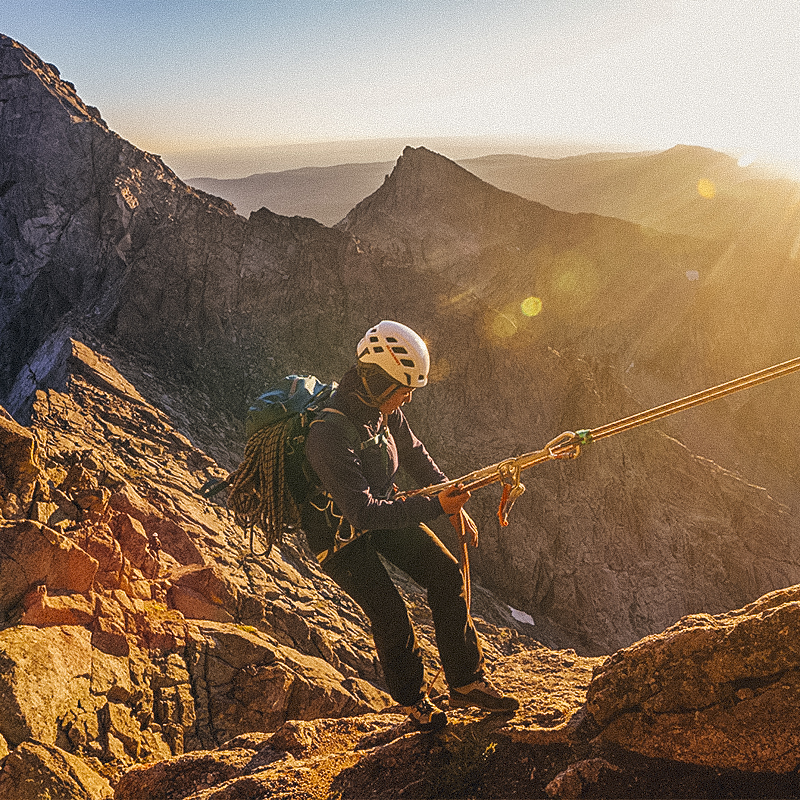 A woman rappelling in Popo Agie Wilderness, Wyoming
