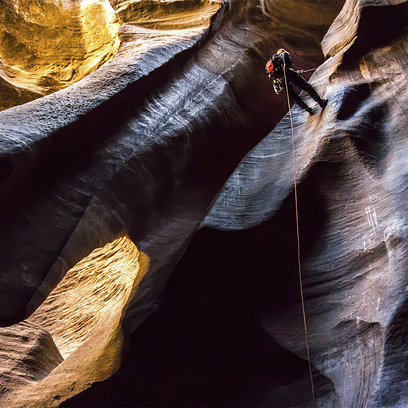 Canyoneer Rappels in the Cathedral Room in  Zion National Park, Utah