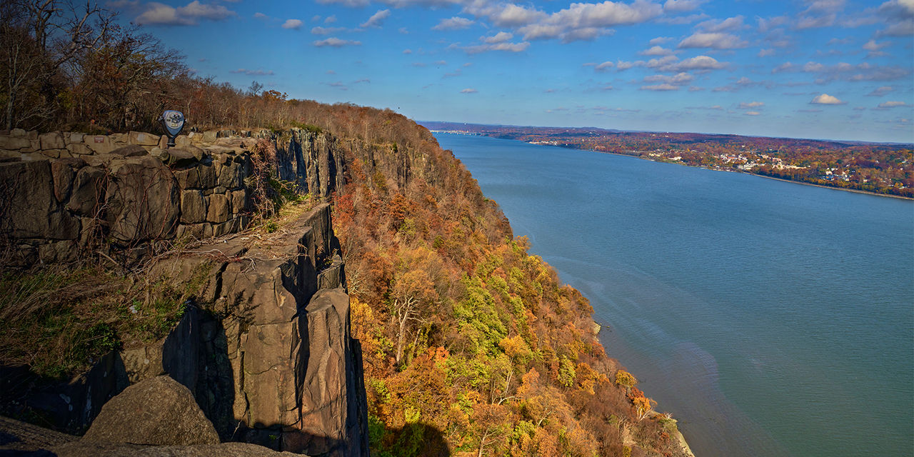 New York state line lookout over the Palisade cliffs and the Hudson river in the fall. 