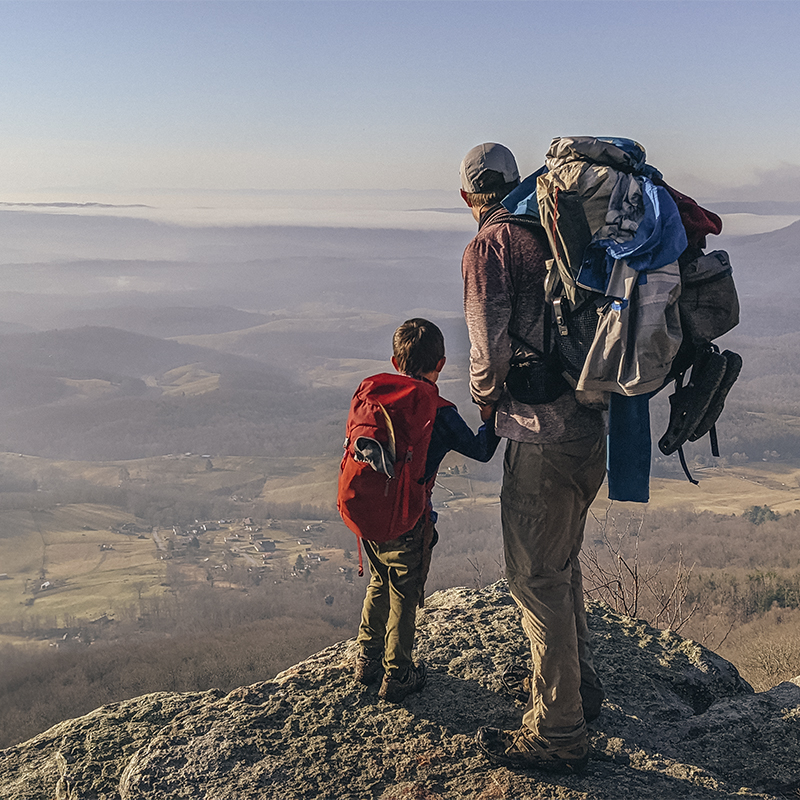 Josh Sutton and his son look at an overlook along the Appalachian Trail