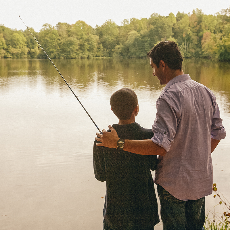 A son and father fishing on Bear Creek Lake