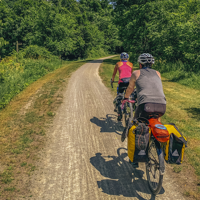A couple is seen bike packing on the  Great Allegheny Passage