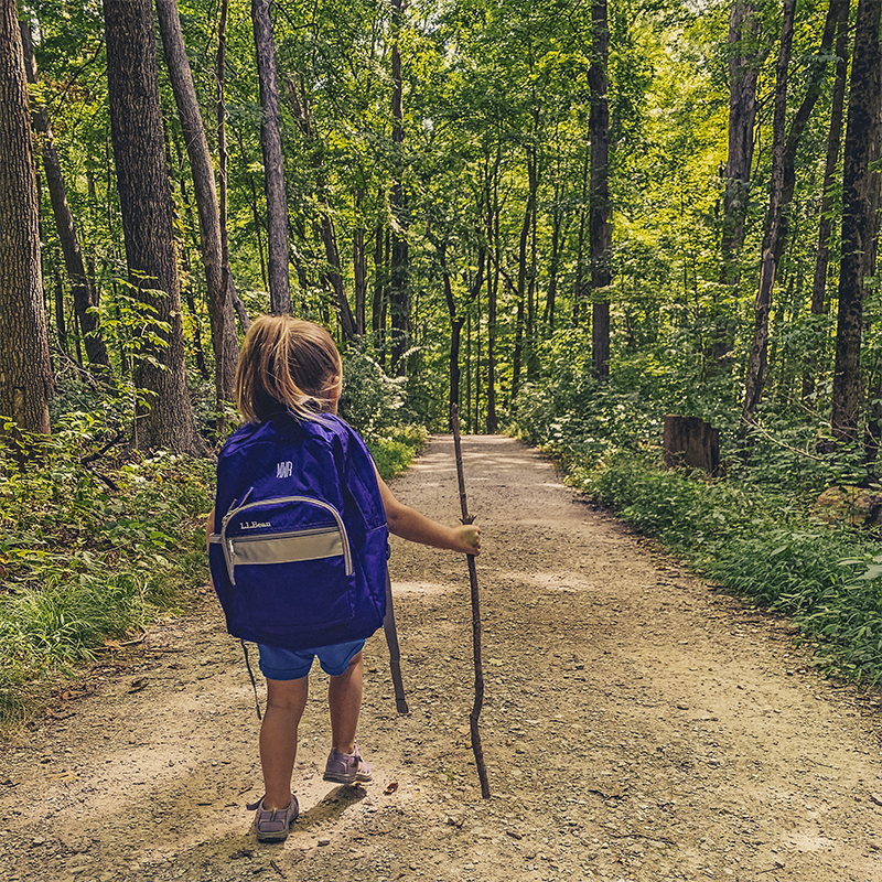  A child hikes on a trail at Highbanks Metro Park. 