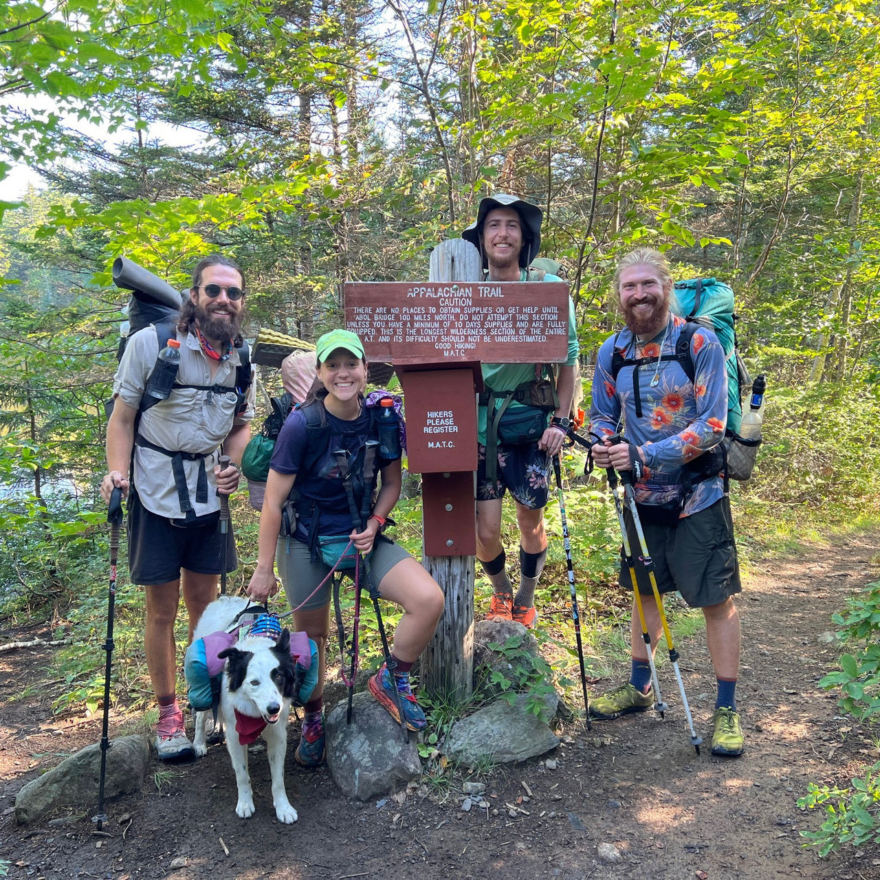 Hikers pose for a photo in the 100 Mile Wilderness