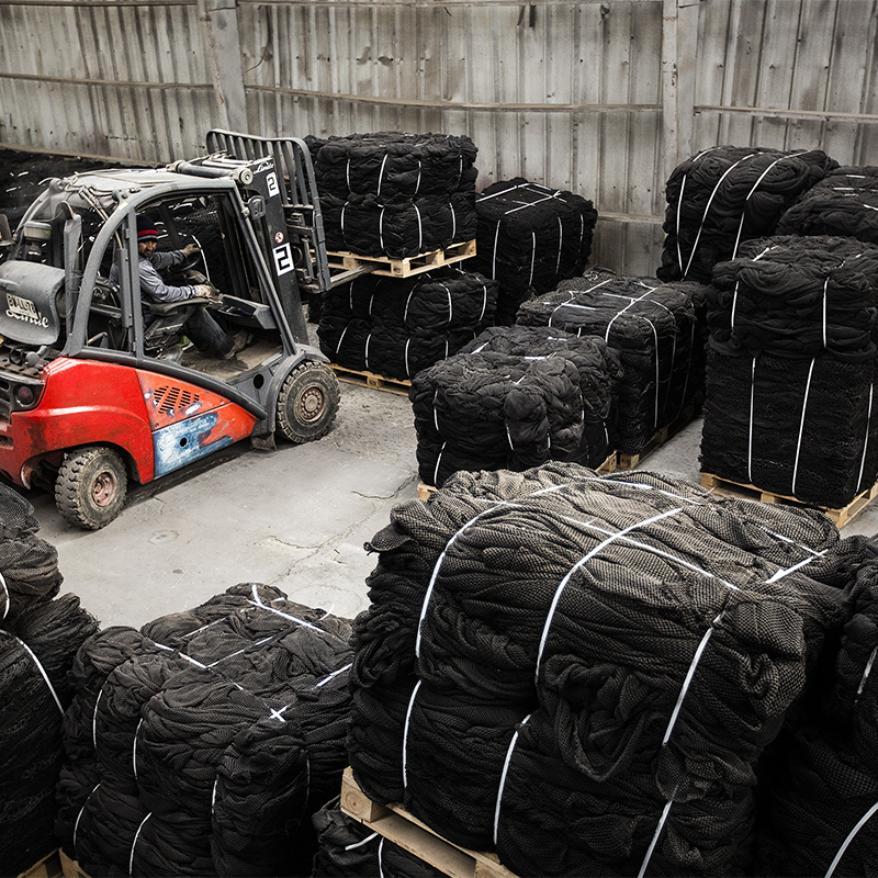 A factory with bundles of fishing nets