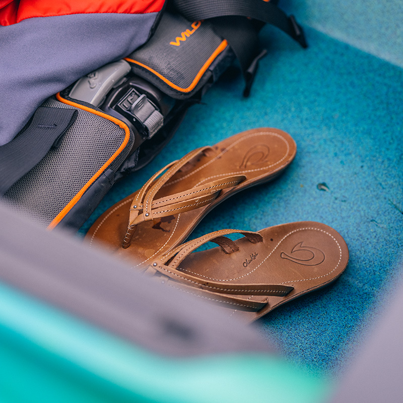 close up of sandals on a kayak