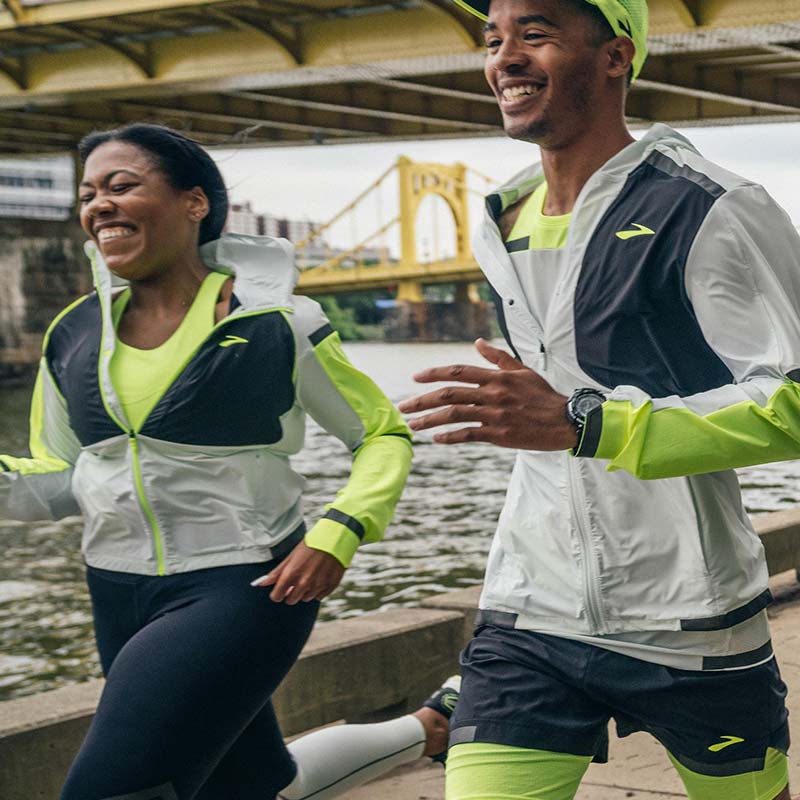 Closeup of runners in matching jackets
