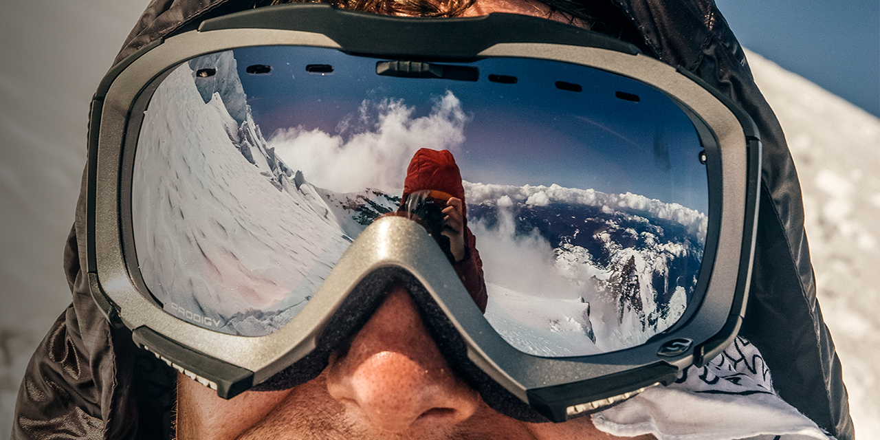 A photo closeup of a mans goggles