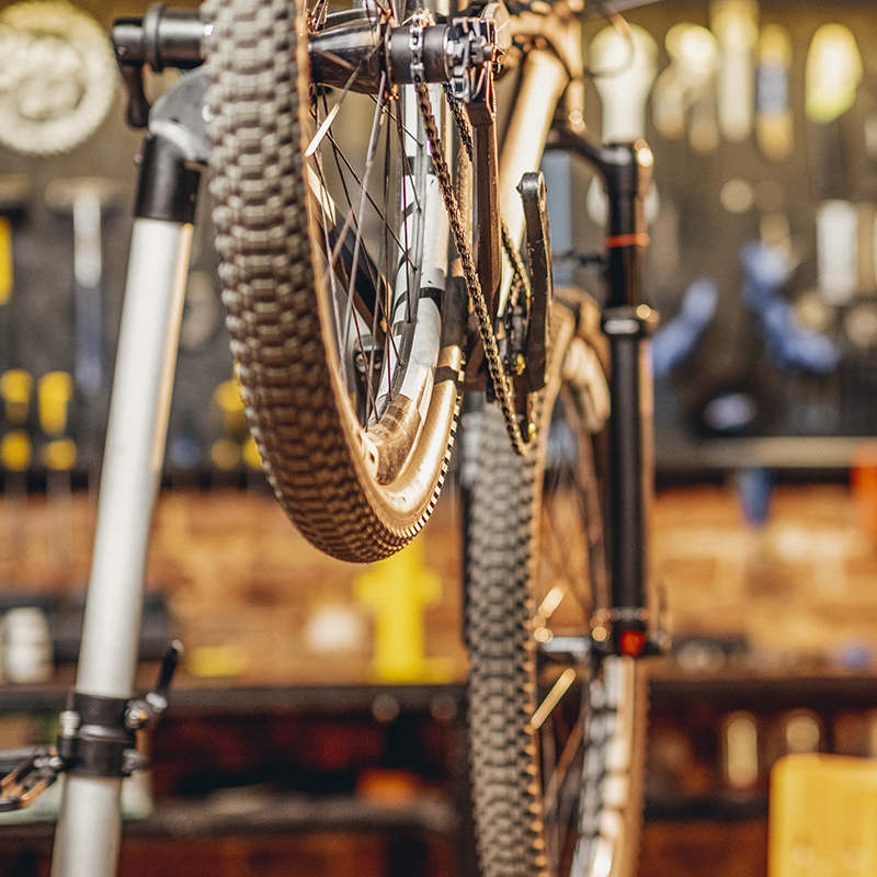 A bike getting fixed on a repair stand