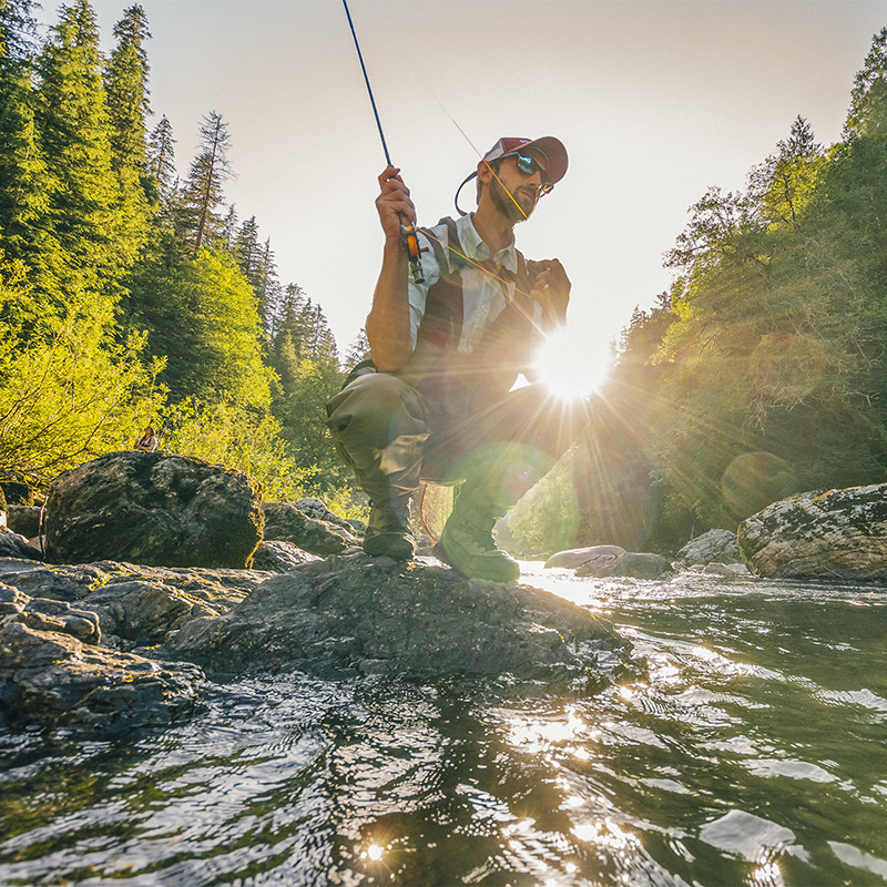 A man fly fishing on the South Fork of the Stillaguamish River, Central Cascades, Washington