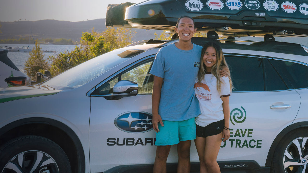 Haley Toy and Gary Huey pose with their Subaru