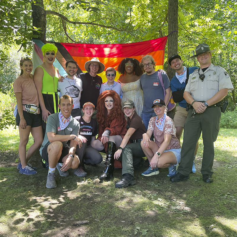 A group poses at the North Face's Summer of Pride event series