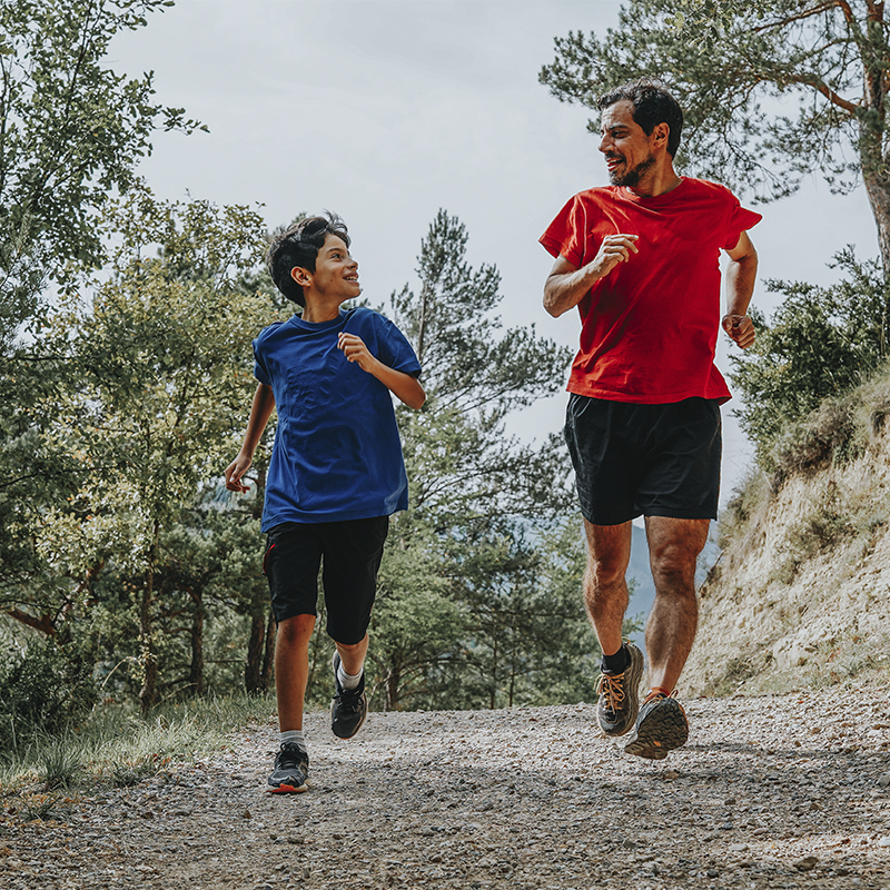 father and son running together