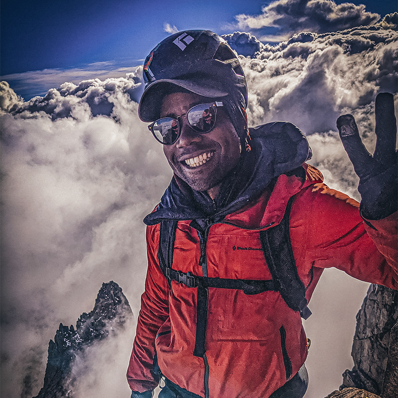 Andrew King on the top of a mountain