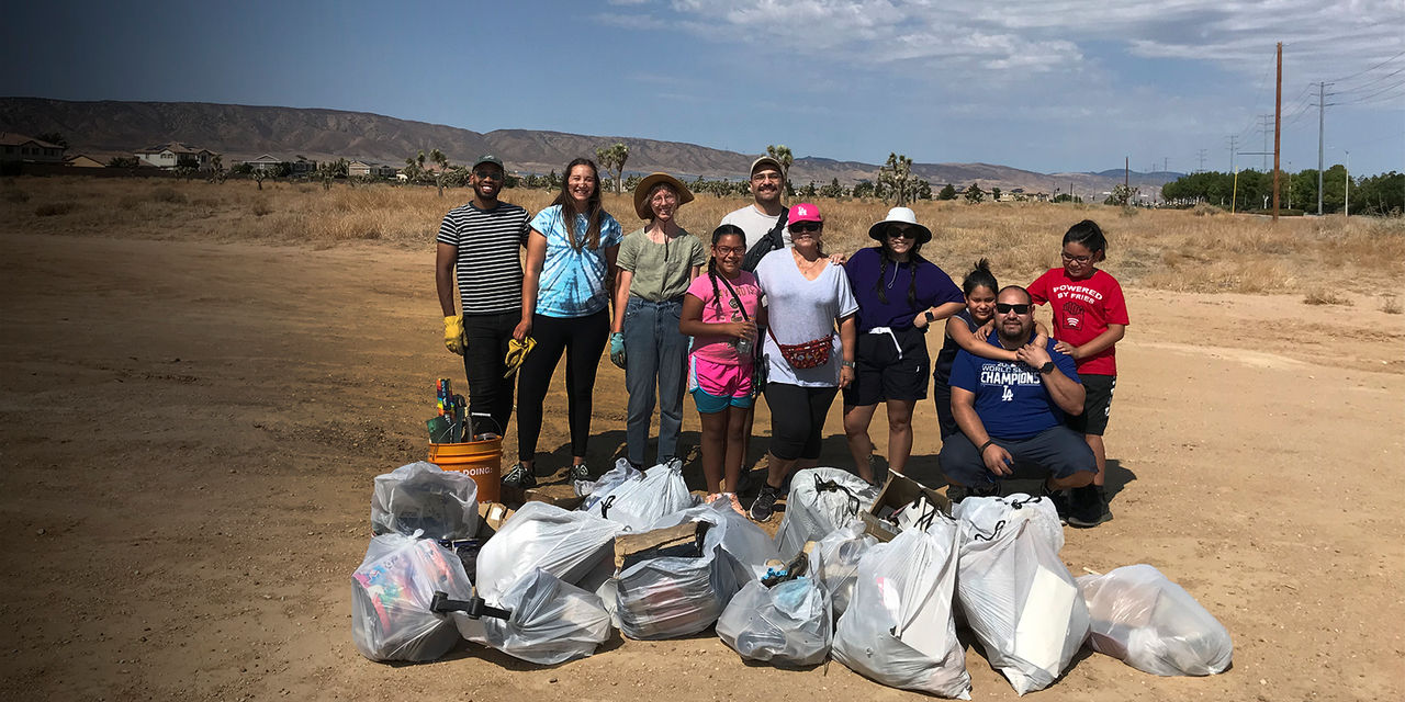 Members of the Hispanic Access Foundation help in a cleanup