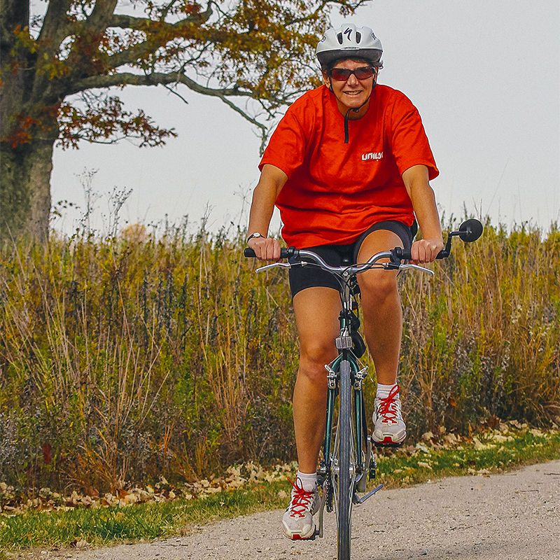A person rides their bike along the Ohio to Erie trail