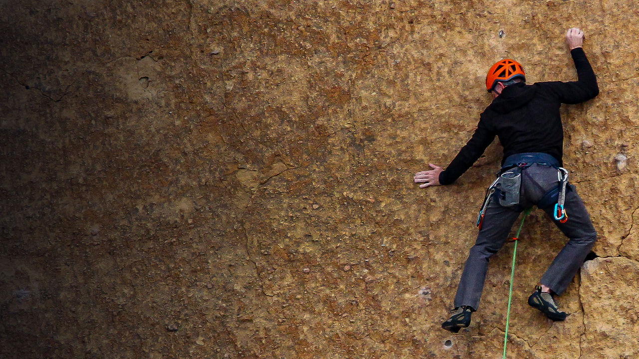 A close up shot of a rock climber