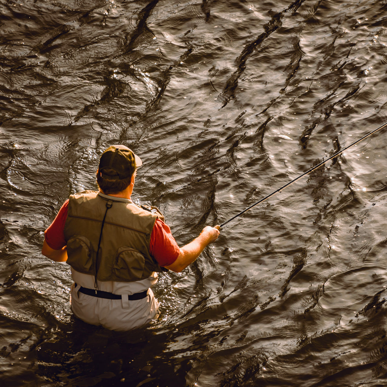 Fly fisherman fishing for stealhead trout on the Rogue River in Southern Oregon