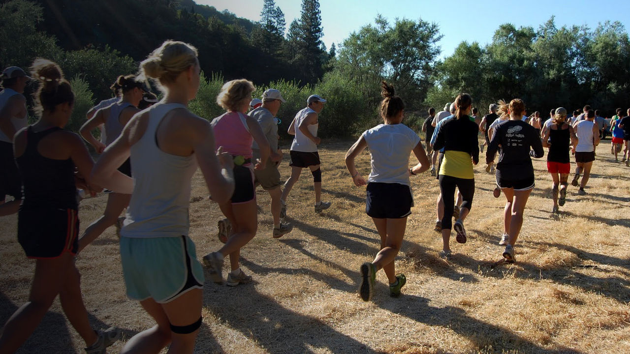 Runners run a race on the Britt Woods Loop